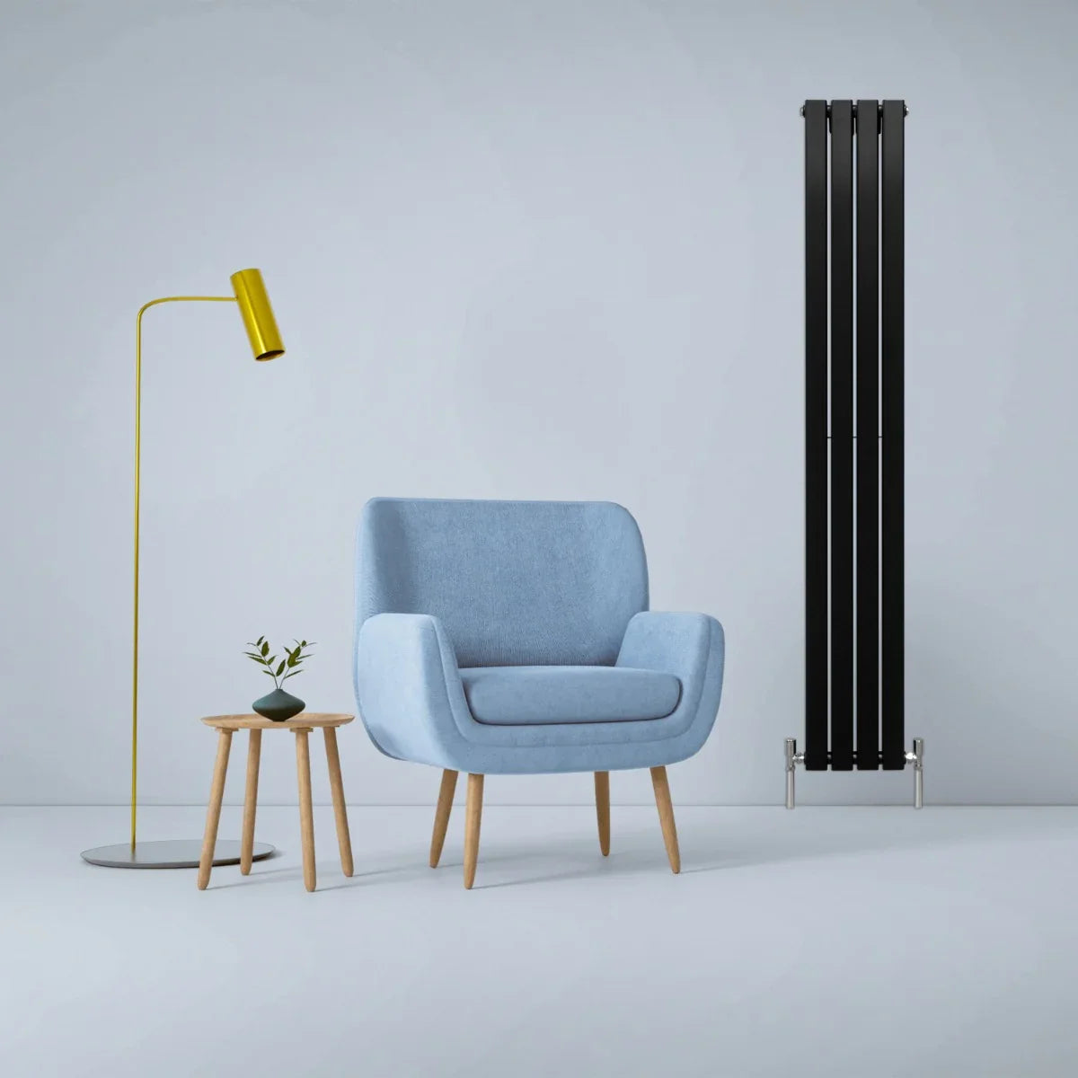 Matt black designer flat panel radiator, 1800mm x 280mm, beside a light blue armchair and stylish floor lamp in a modern setting