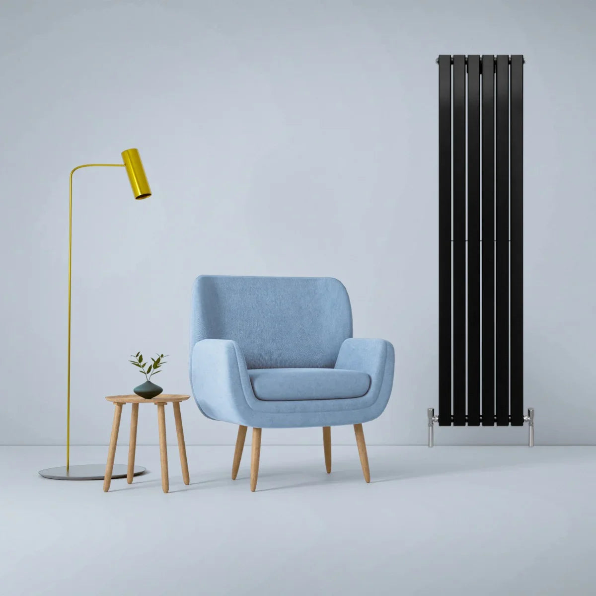 Matt black designer flat panel radiator, 1800mm x 420mm, sleek vertical design, complements modern decor with a blue chair and yellow lamp