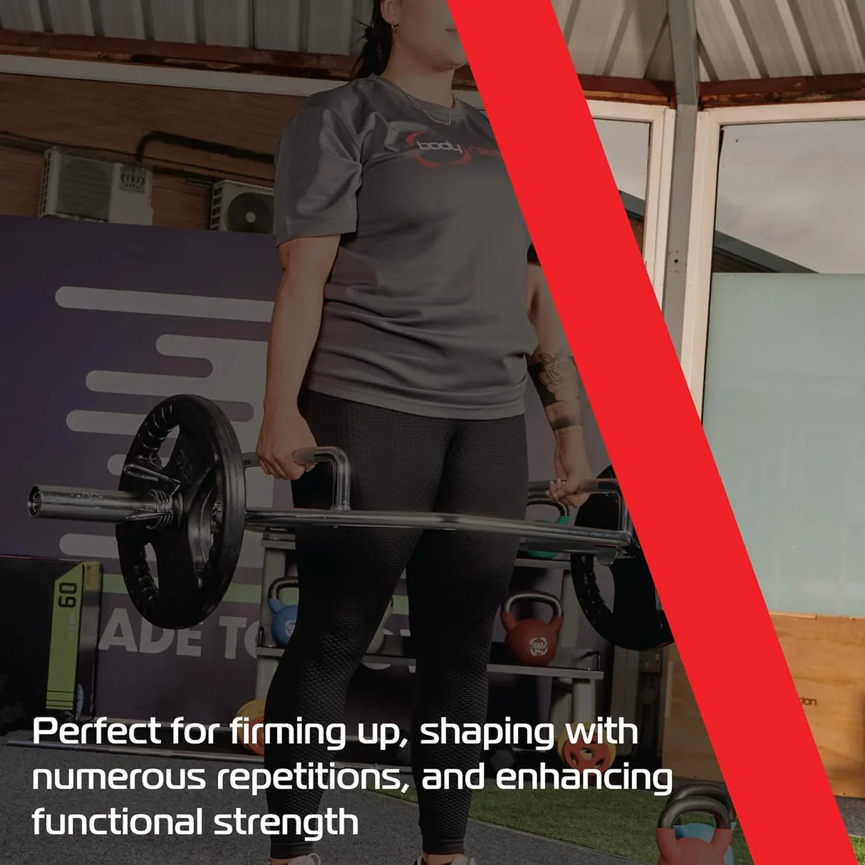 Black 10kg Olympic tri-grip rubber weight plates on a barbell, ideal for strength training and enhancing functional fitness