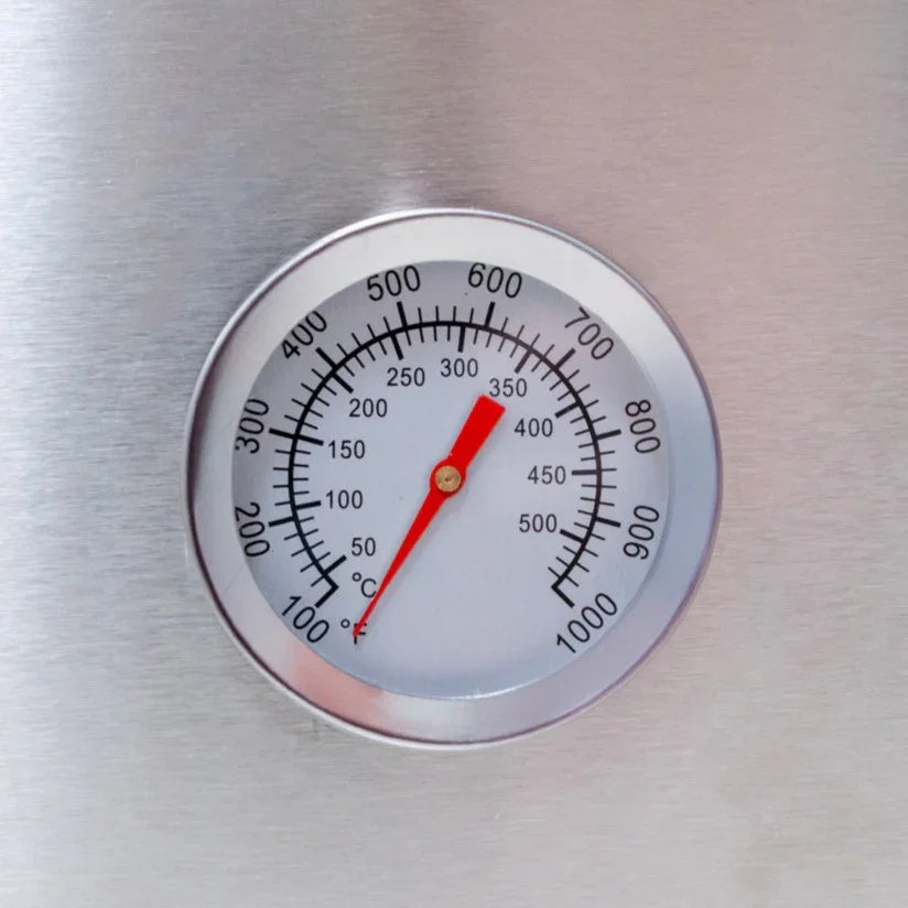 Stainless steel thermometer with a red needle, displaying temperature range from 0 to 1000°F for the outdoor pizza oven