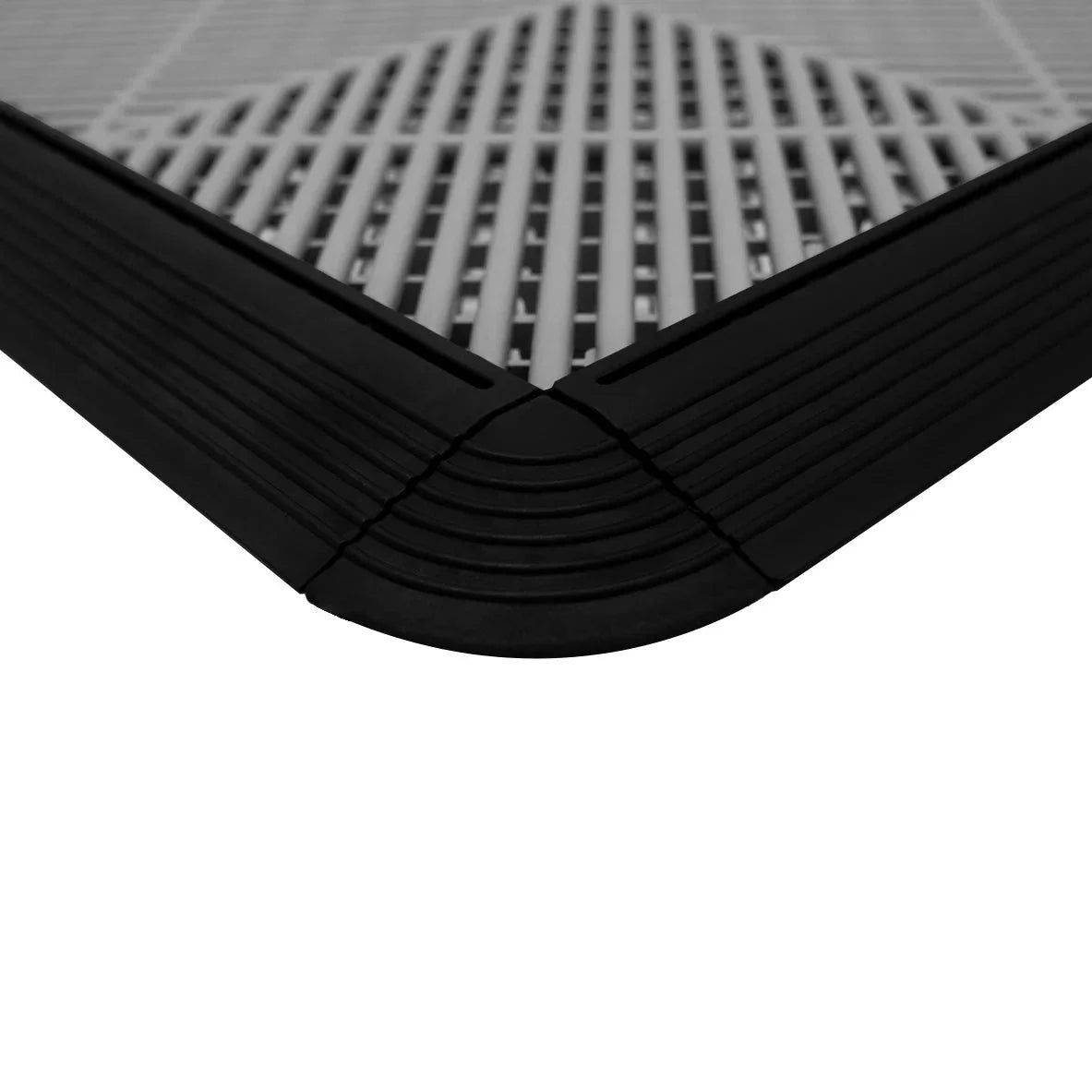 Vented garage floor tile corner in grey with blue accents, featuring a textured surface and durable edging for easy installation