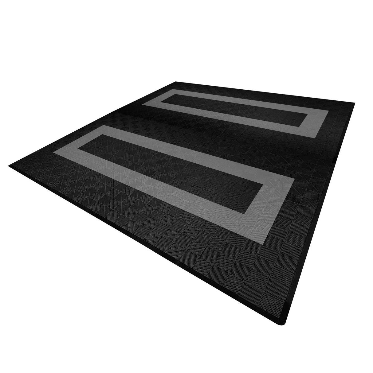 Vented garage floor tiles in black and grey with a textured surface, featuring a modern geometric design and finished edges
