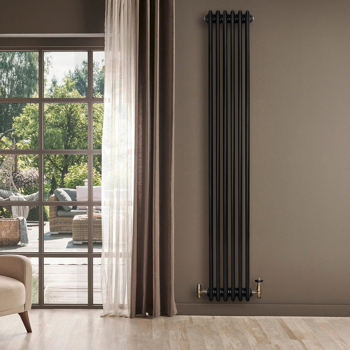 Traditional black 4 column radiator, 1800 x 290mm, featuring a sleek design and elegant finish, mounted on a wall in a stylish room