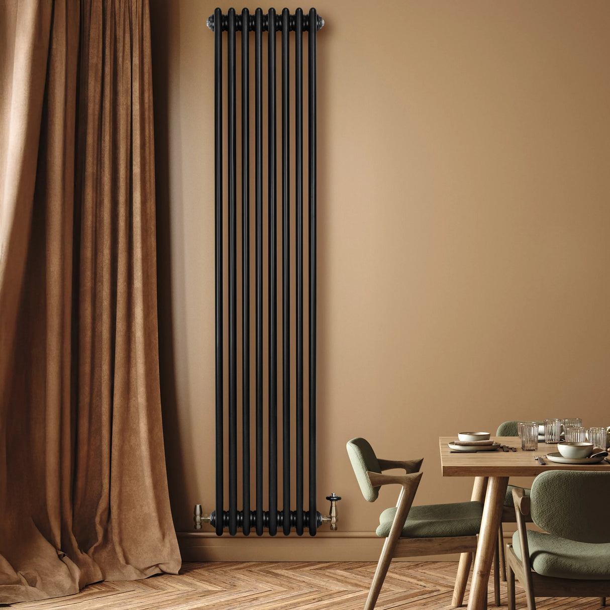 Traditional black 4 column radiator, 1800 x 380mm, featuring a sleek design against a warm beige wall, enhancing modern decor