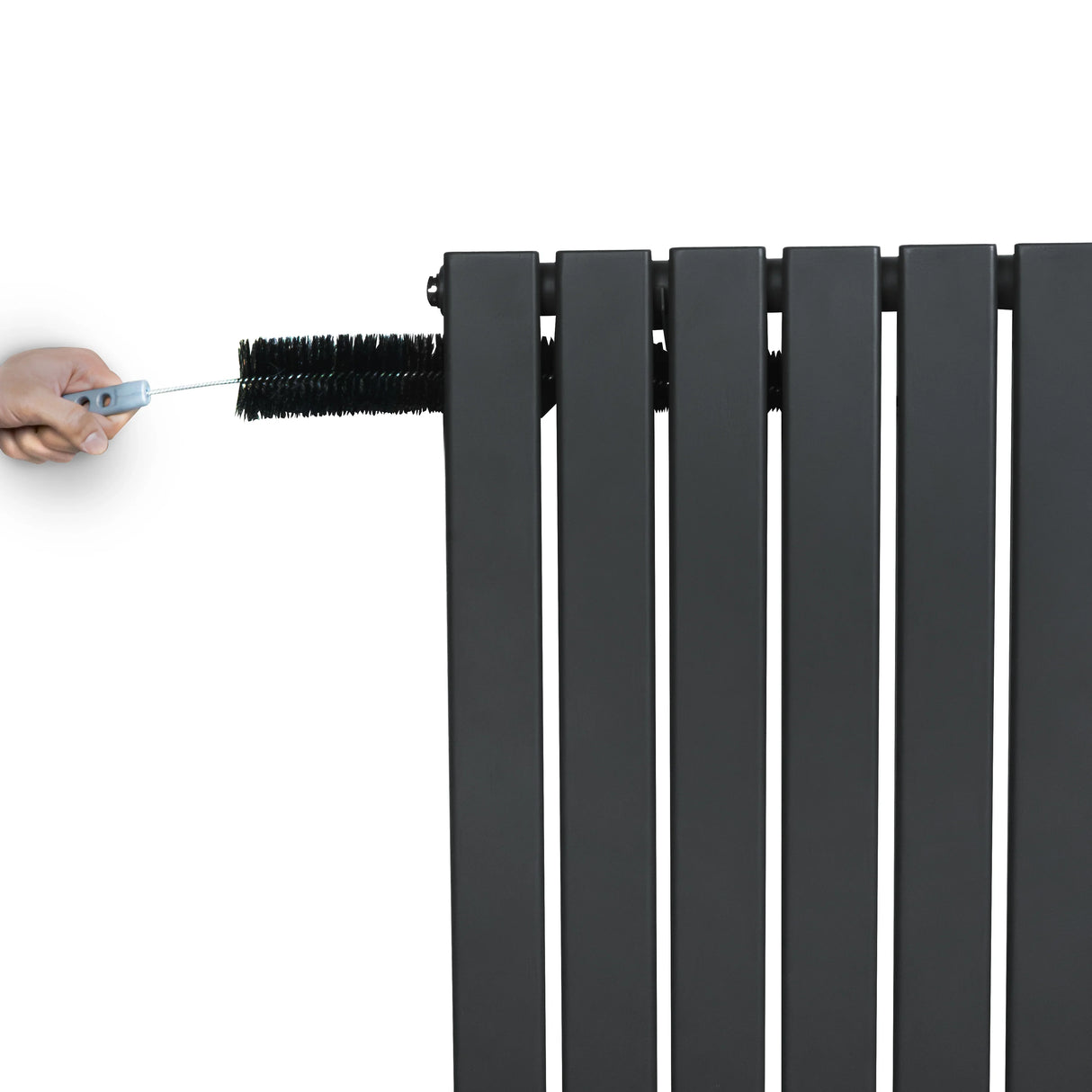 Flat single column radiator in anthracite grey, featuring sleek vertical panels and a hand adjusting the valve at the top