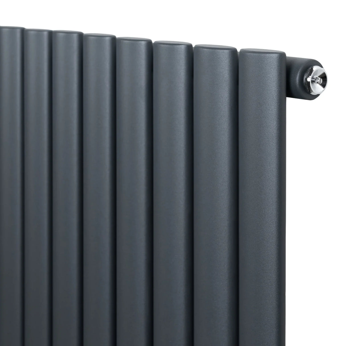 Oval single column radiator in anthracite grey, featuring sleek, rounded tubes and a modern design, ideal for stylish heating solutions