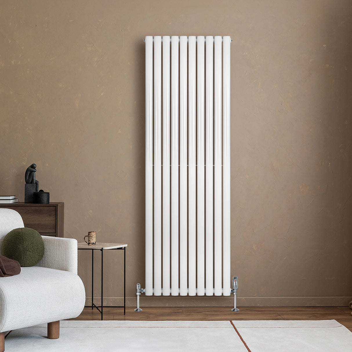 Sleek white oval single column radiator, 1800 x 600mm, mounted on a wall, complementing a modern living room with neutral tones