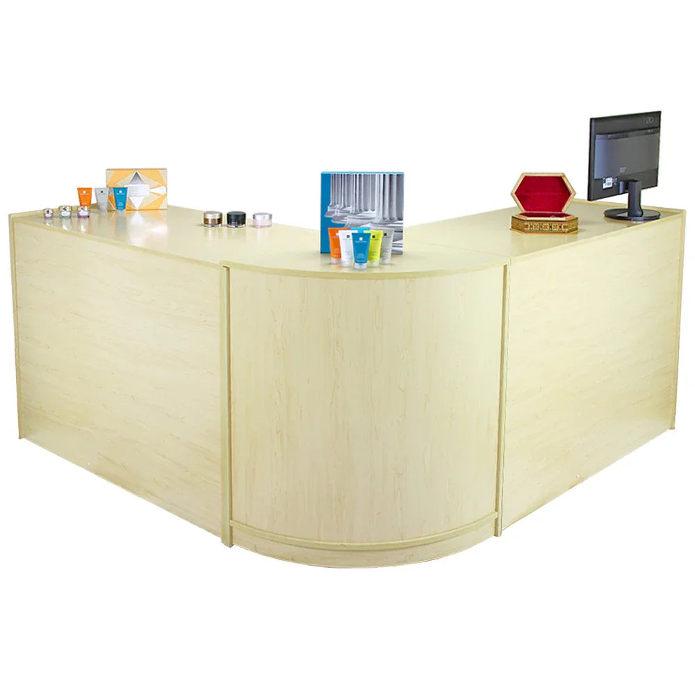 Zodiac Maple Shop Counter features a light maple finish, curved edges, and ample space for retail displays and a monitor