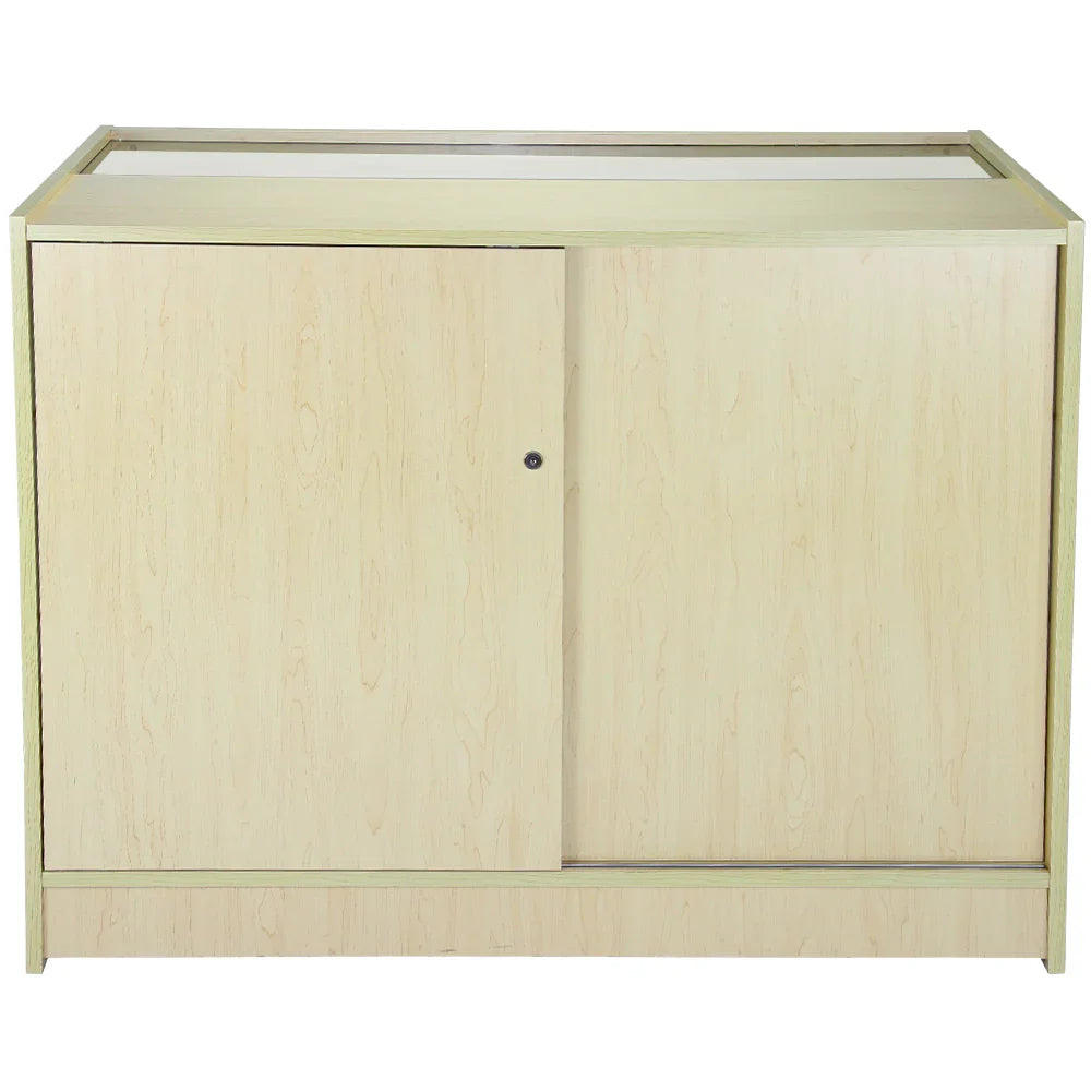 Maple glazed display counter K1200 featuring a smooth, light wood finish, sliding doors, and a sleek, modern design for showcasing products