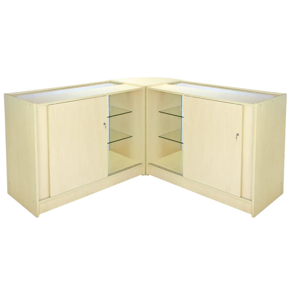 Light maple wood retail display set featuring corner design, glass shelves, and sliding doors for organized product presentation