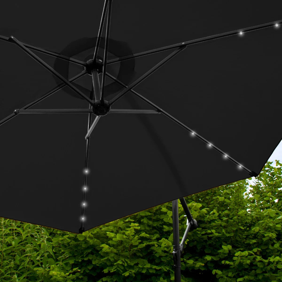 Black 3m LED cantilever parasol with a sleek design, featuring a plain base and illuminated edges, perfect for outdoor settings