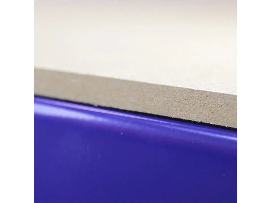 Close-up of the smooth, light-colored workbench surface with a sturdy purple edge, highlighting durability and quality craftsmanship