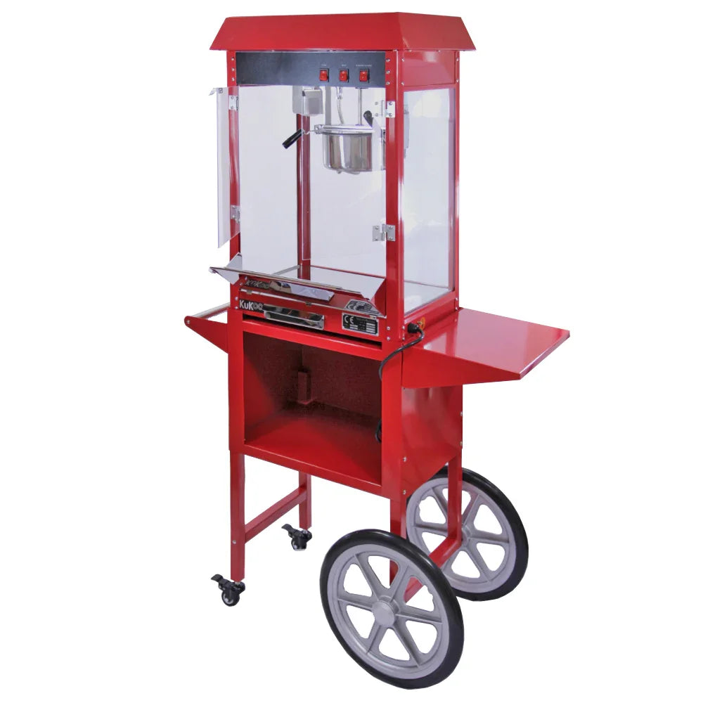 Bright red KuKoo 8oz popcorn maker machine with a cart, featuring a glass display, stainless steel kettle, and large wheels for mobility