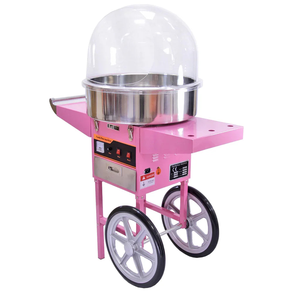 KuKoo pink candy floss machine with stainless steel bowl, protective dome, and cart featuring large wheels for easy mobility
