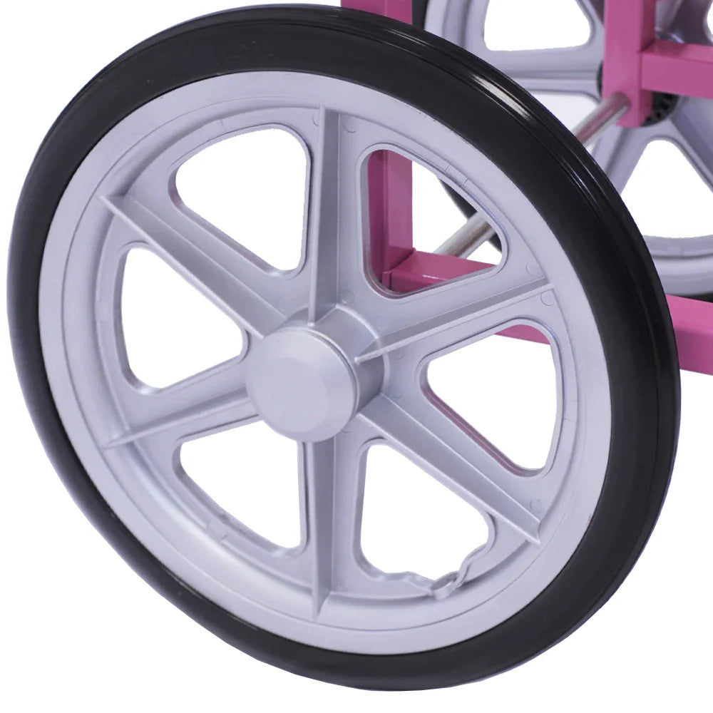 Close-up of the pink and silver wheel of the KuKoo Candy Floss Machine cart, showcasing its durable design and smooth rolling capability