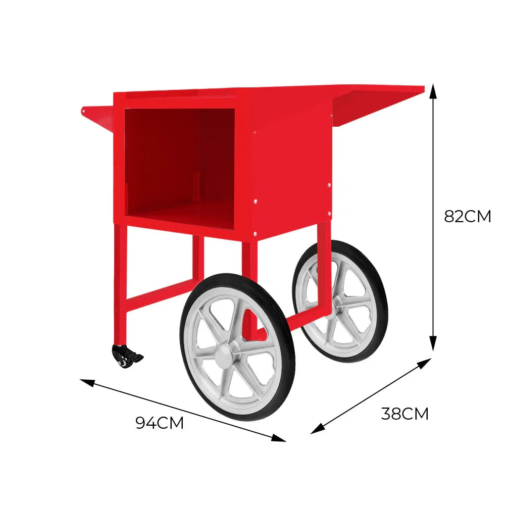 Bright red KuKoo popcorn machine cart with a spacious storage compartment, sturdy wheels, and a vintage design, perfect for events