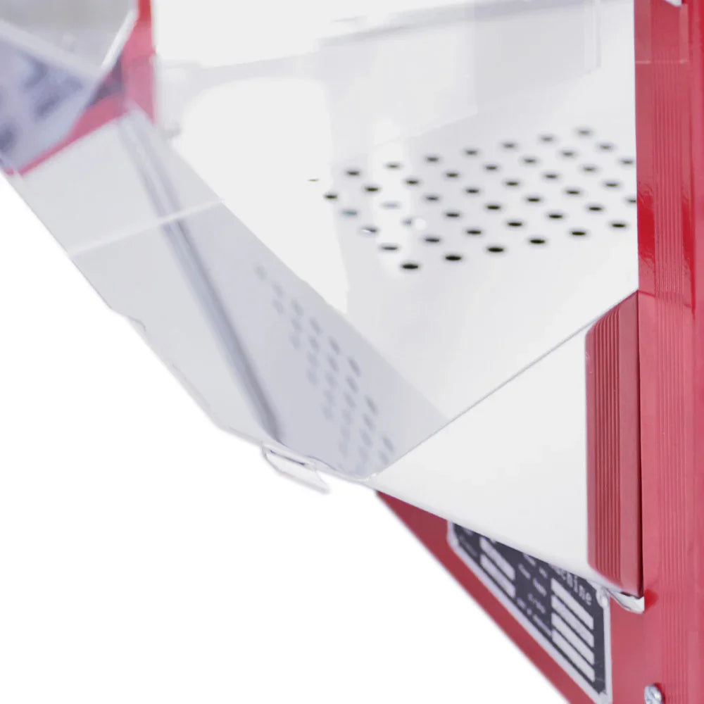 Clear acrylic door of the KuKoo 8oz Commercial Popcorn Machine, showcasing the stainless steel interior and ventilation holes