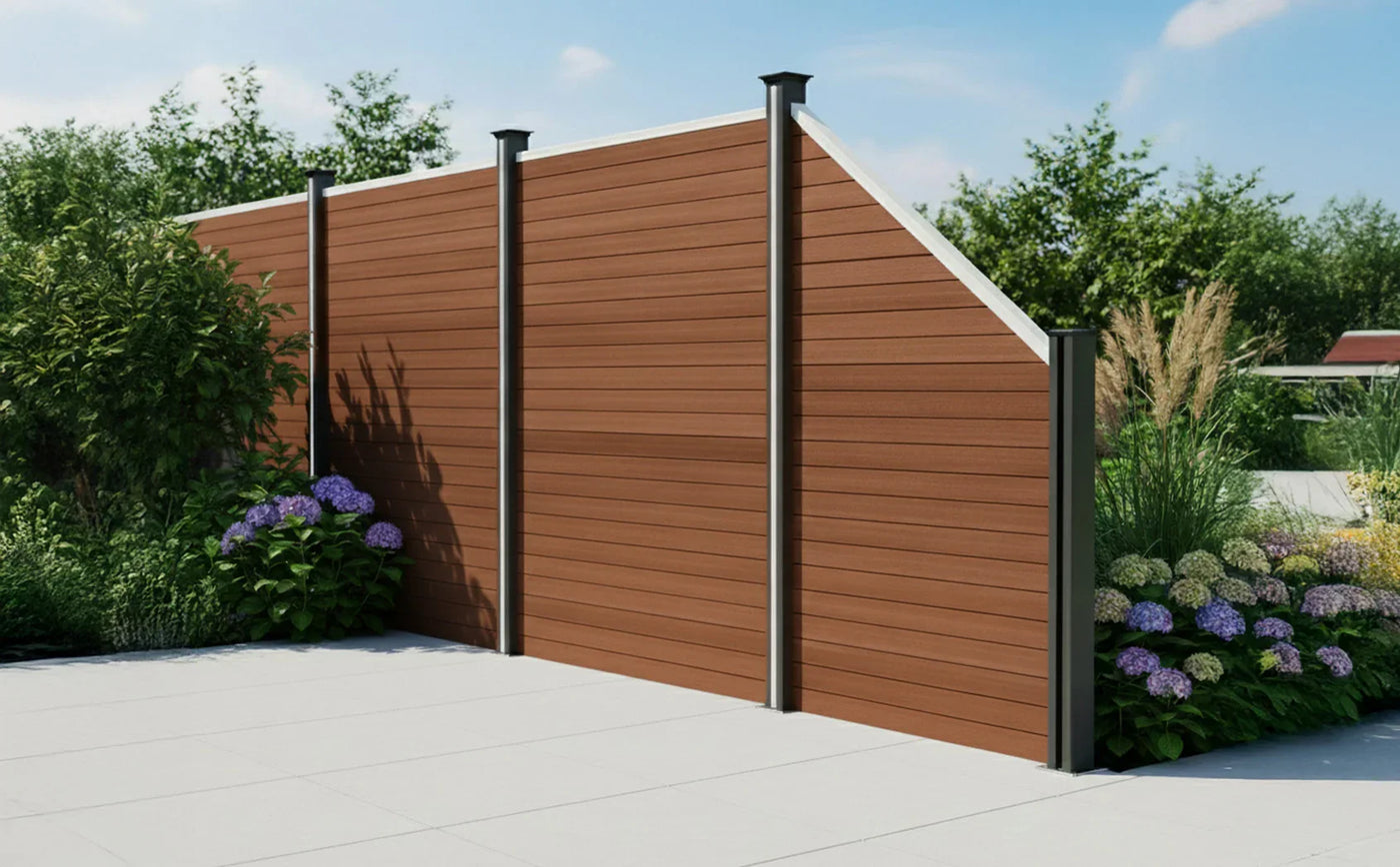 Modern wooden fence with a rich brown finish, complemented by sleek metal posts, surrounded by vibrant green plants and colorful flowers