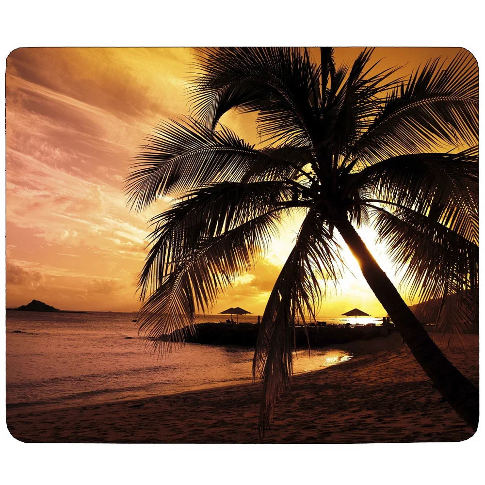Mouse mat with a vivid sunset beach scene featuring silhouetted palm trees and calm ocean waves.