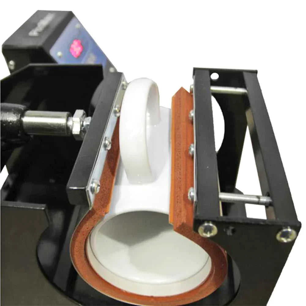 Close-up of the PixMax 5 in 1 Mug Heat Press showcasing the heating element and white ceramic mug in a black frame