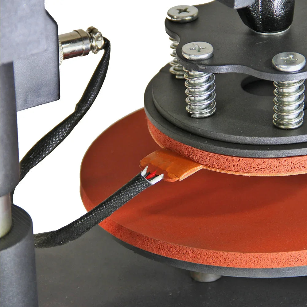 Close-up of the Plate Press with red silicone pads, metal springs, and a black base, showcasing its sturdy construction and design details