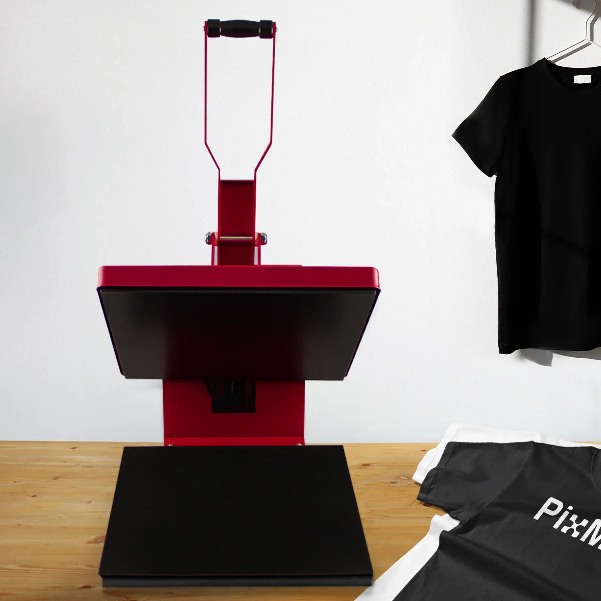 PixMax T-Shirt Sublimation Heat Press Machine in vibrant red, featuring a clam design, 38cm x 38cm heating plate, and sturdy handle