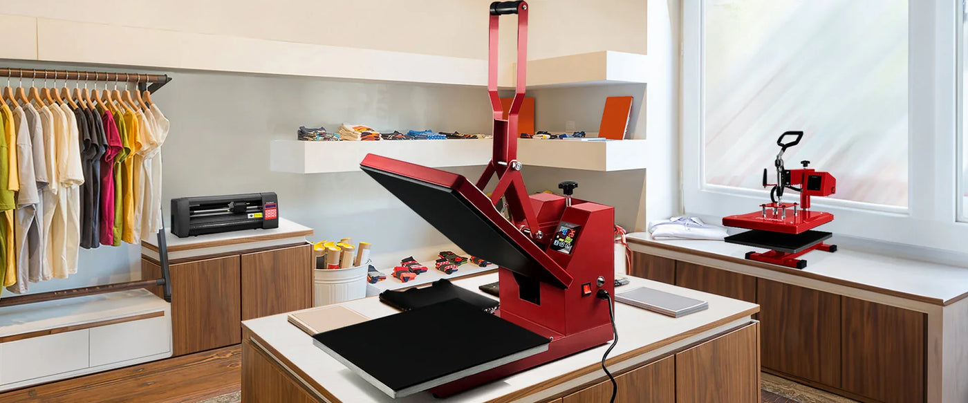 Red heat press machine on a workbench in a room with clothes and equipment.