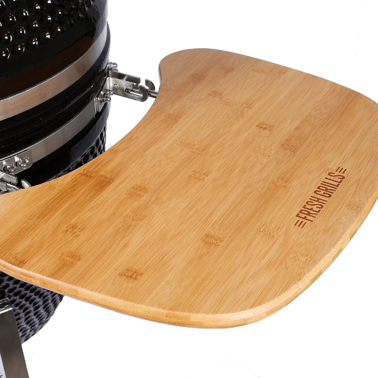 Bamboo side shelf attached to the Fresh Grills Kamado Charcoal BBQ Grill 21", showcasing a smooth surface and engraved logo