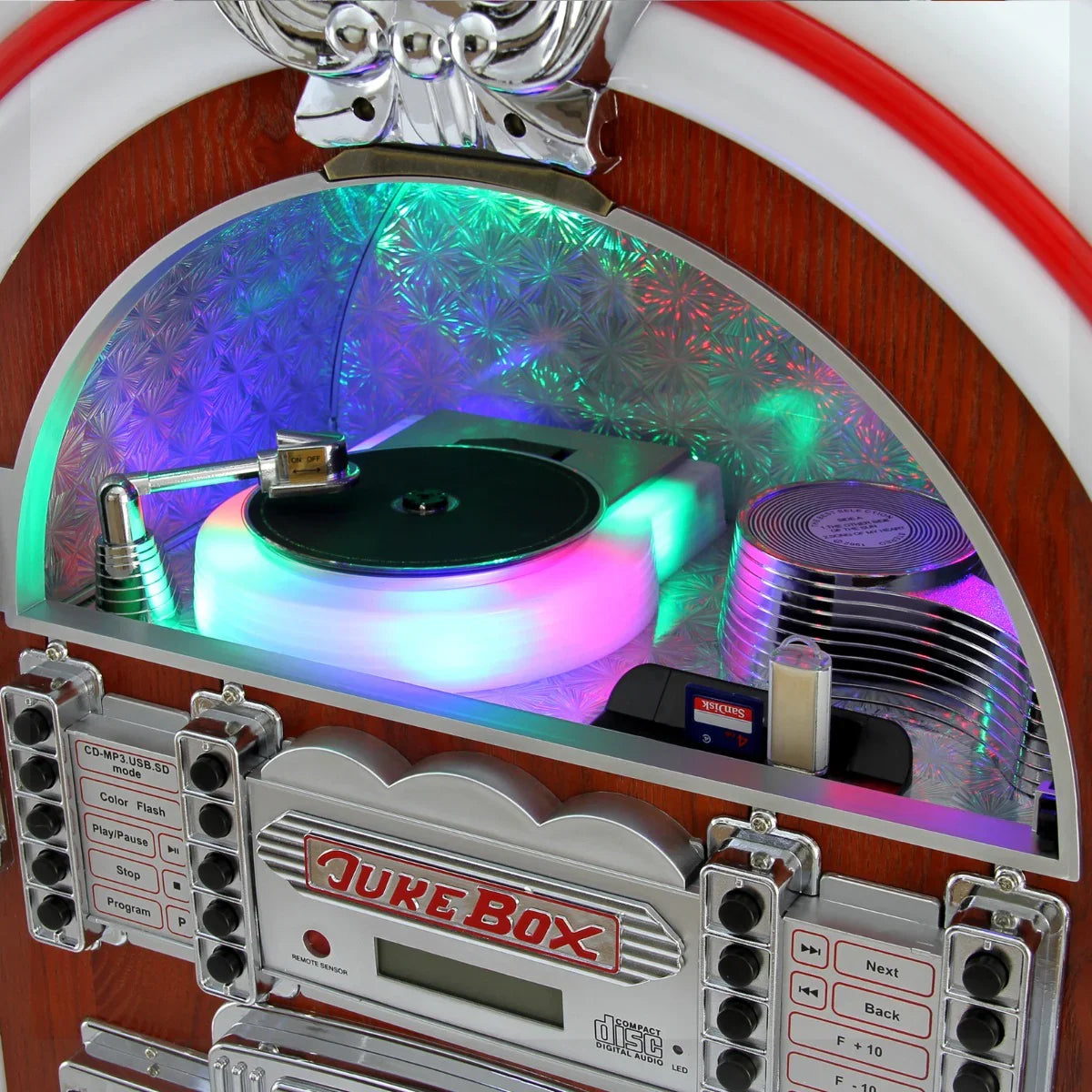 Retro style illuminated jukebox sound system with colorful LED lights, vinyl record player, and chrome accents, showcasing a vintage design