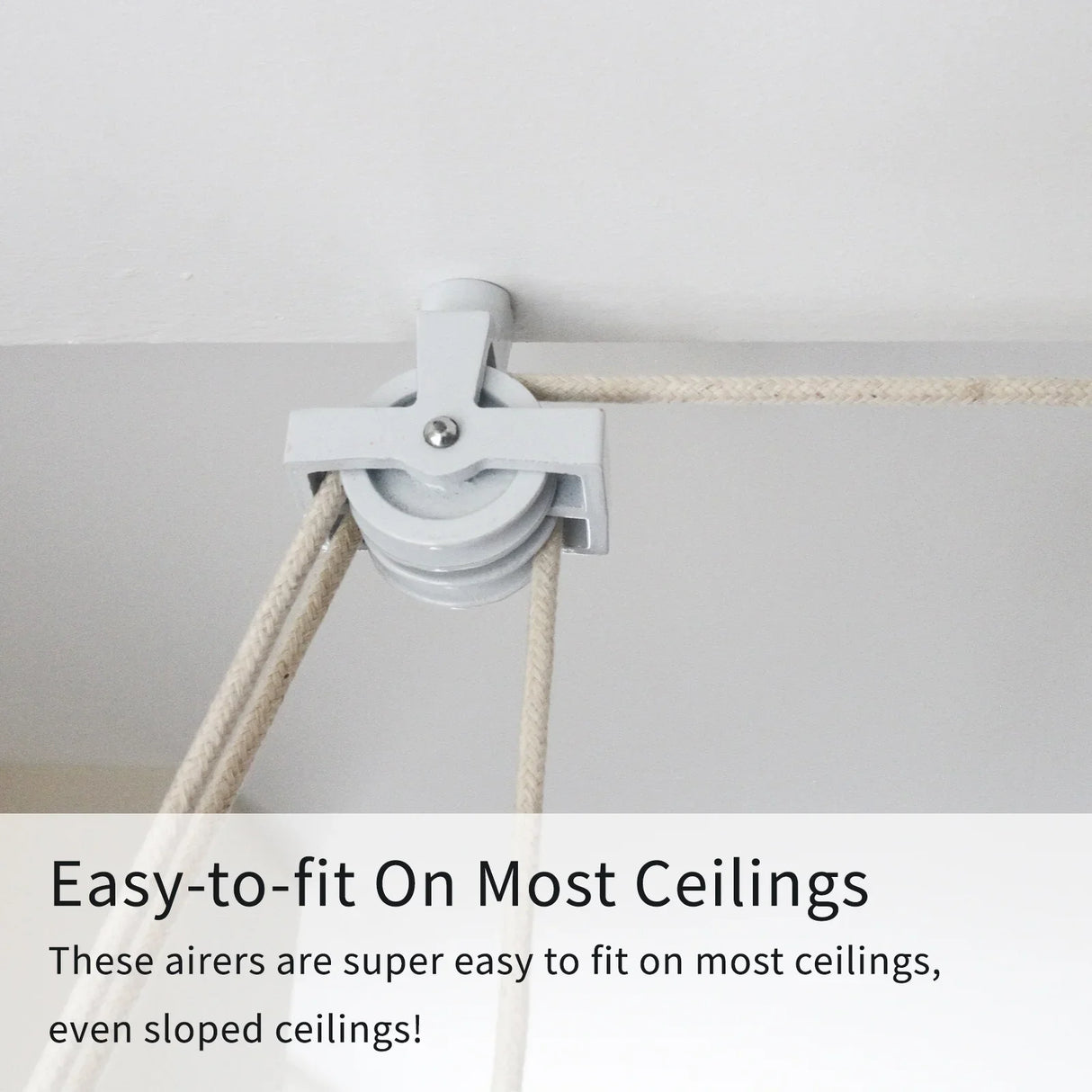Ceiling pulley clothing airer in white with durable rope, designed for easy installation on various ceiling types, including sloped ceilings