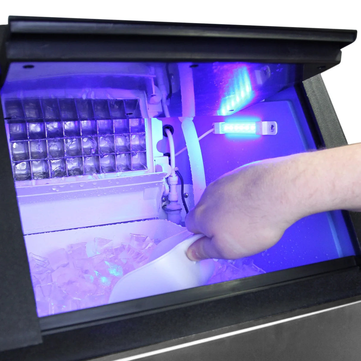 KuKoo Commercial Ice Machine with illuminated interior, showing clear ice cubes and a hand scooping ice with a white scoop
