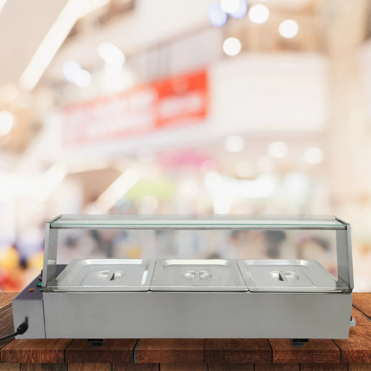 Stainless steel KuKoo 3 Pan Wet Well Bain Marie with glass lid, three compartments, and sleek design, ideal for food service
