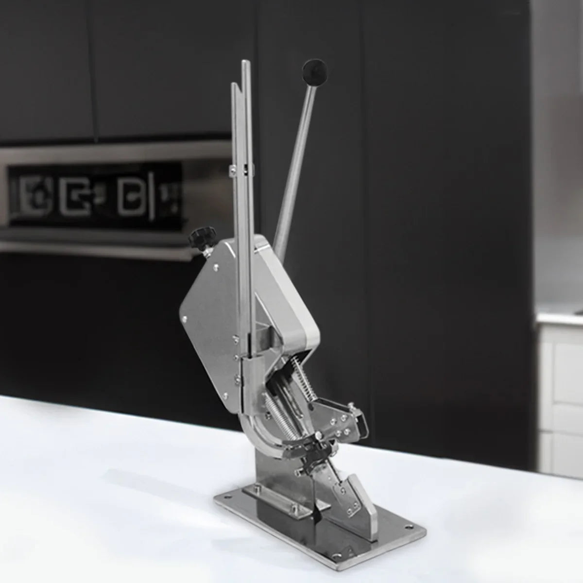 Stainless steel KuKoo 7L sausage stuffer with a sturdy lever, designed for easy operation and efficient sausage filling