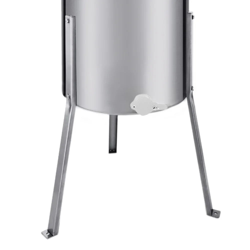 Stainless steel manual honey extractor with a cylindrical body, sturdy legs, and a honey valve for easy dispensing