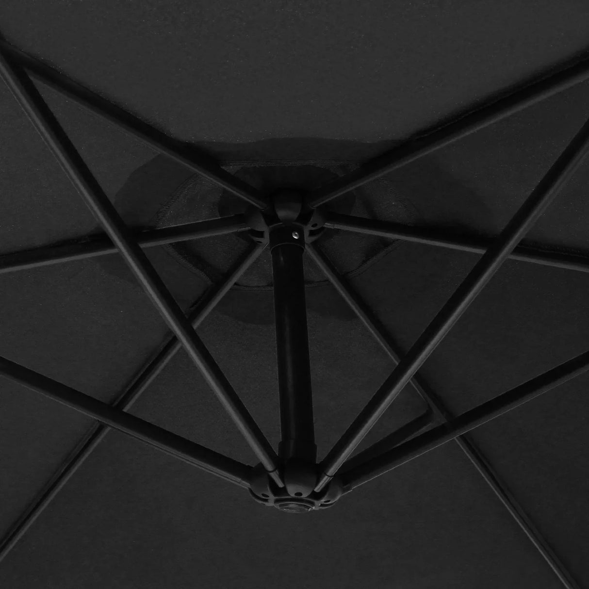 Black cantilever parasol showcasing a sturdy metal frame and a large, round canopy with a sleek, textured black finish