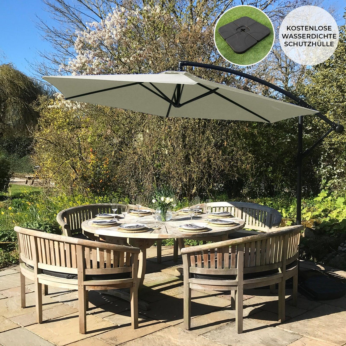 Cream cantilever parasol with a sturdy square base, providing shade over a round dining table set in a lush garden setting
