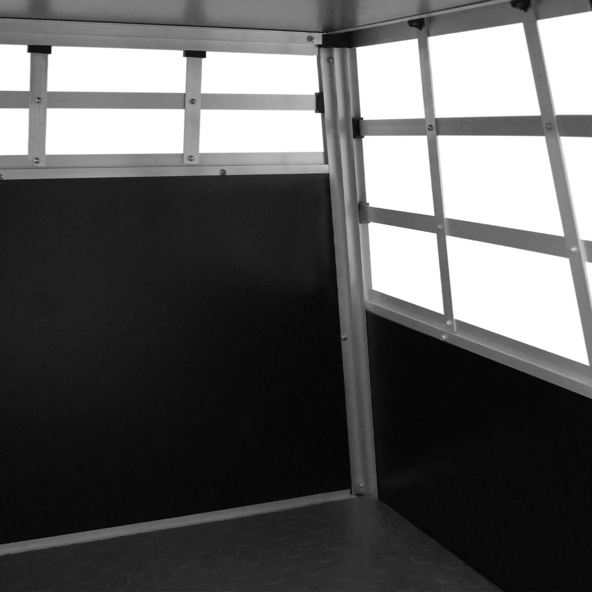Small single door car dog crate featuring a sturdy metal frame, black interior, and ventilation slats for airflow and visibility