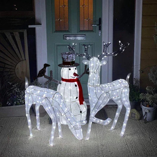 Light up reindeer stag, doe, and snowman set with white LED lights, festive red scarf, and decorative top hat, perfect for holiday decor