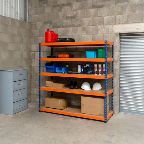 Bright orange shelving unit with blue metal frame, featuring tools, boxes, and safety gear in a spacious, organized garage setting