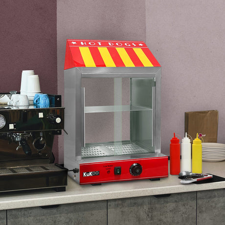 Bright red hot dog warmer with a striped roof, glass front, and stainless steel accents, set against a neutral kitchen backdrop