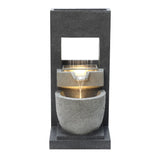 Elegant electric water feature with cascading water, featuring textured gray stone and a sleek modern design, perfect for outdoor decor