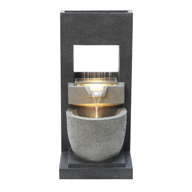 Elegant electric water feature with cascading water, featuring textured gray stone and a sleek modern design, perfect for outdoor decor