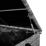 Grey rattan cushion storage box with a textured woven design, featuring a sturdy lid and interior black lining for easy access