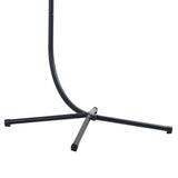 Curved black metal stand supporting a rattan hanging egg chair, featuring a woven texture and a sleek, modern design