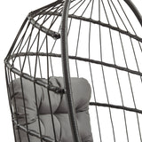 Black rattan hanging egg chair featuring a cushioned gray seat, woven texture, and an open, airy design perfect for relaxation