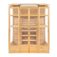 Victorian greenhouse with natural wood finish, featuring large glass panels, double doors, and multiple shelves for plants