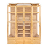 Victorian greenhouse with natural wood finish, featuring large glass panels, double doors, and multiple shelves for plants
