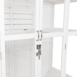 Elegant Victorian greenhouse in white wood, featuring glass panels, silver handles, and a secure lock for plant protection