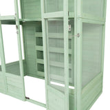 Victorian greenhouse in soft green wood, featuring glass panels, multiple shelves, and a hinged door for easy access