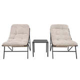 Stylish 3 piece bistro set featuring two cream cushioned chairs with black metal frames and a matching square table